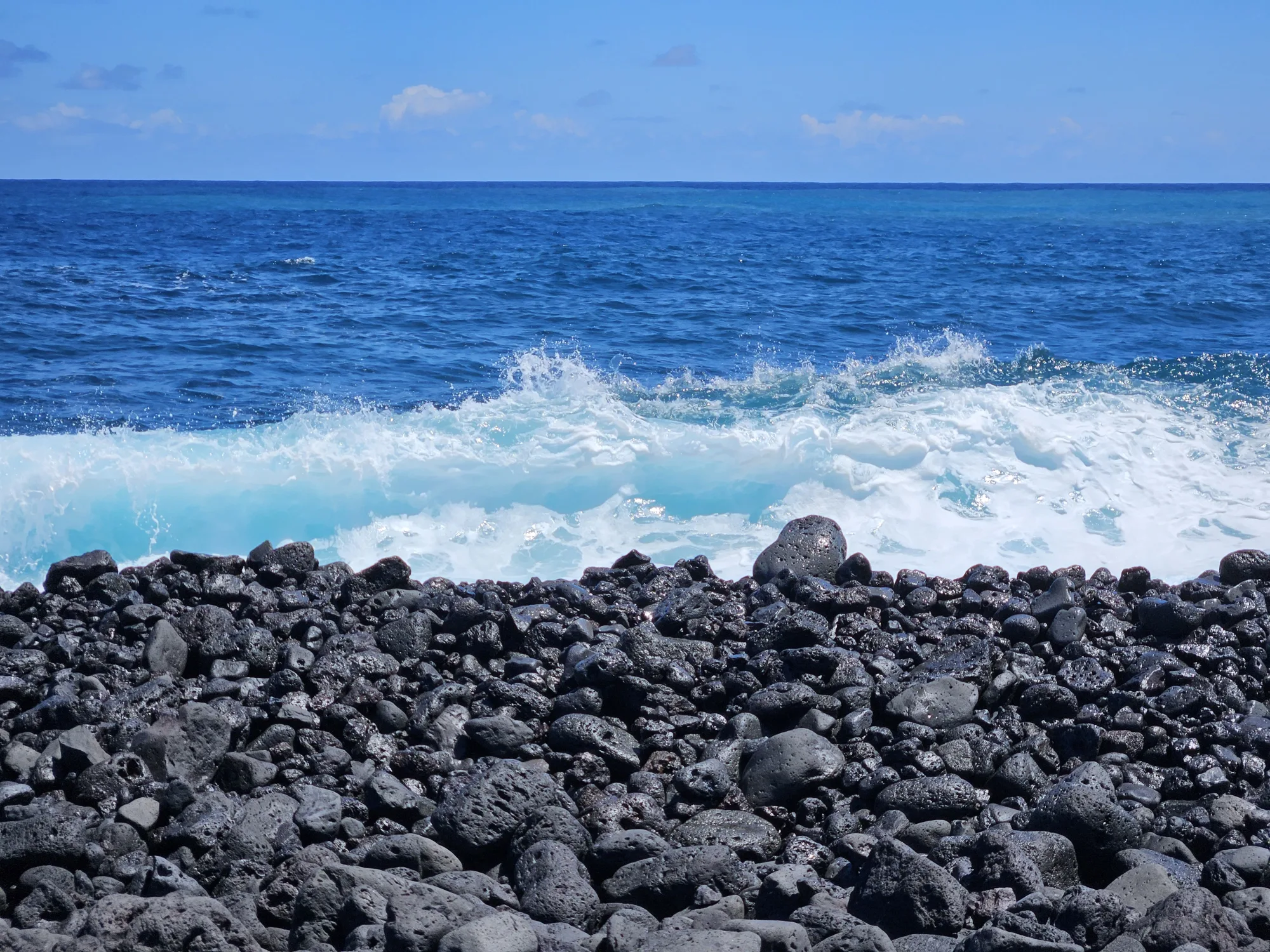 Beach in Hilo, full of Volcanic Rocks